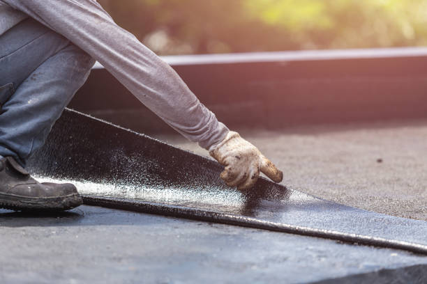 Professional Exterior Waterproofing technician working in Amherst, WI